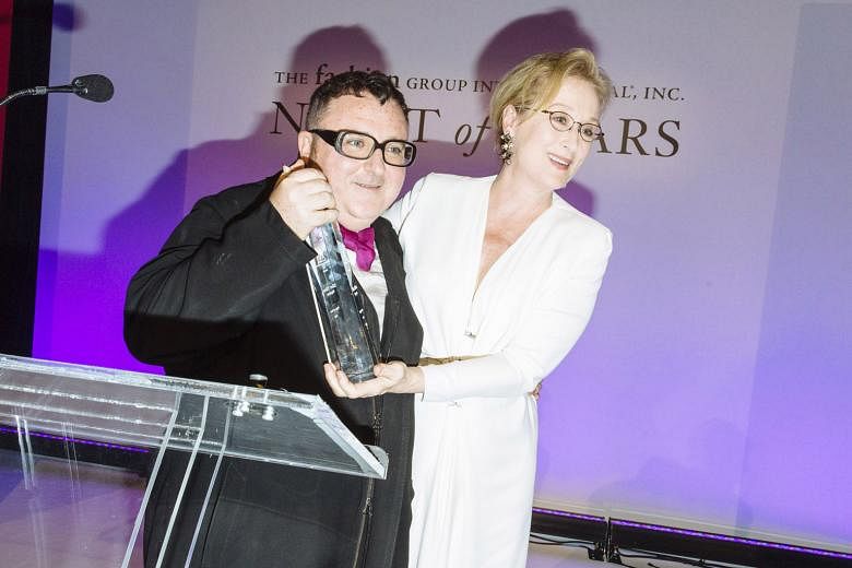 Actress Meryl Streep presenting the Superstar award to Elbaz at Fashion Group International's industry gala in New York last week, during which he expressed frustration with the fashion system.