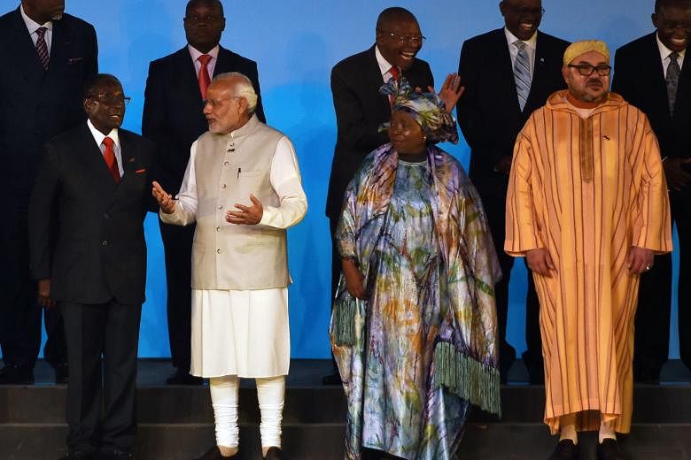 (From left) Zimbabwean President Robert Mugabe, Indian Prime Minister Narendra Modi, African Union chairman Nkosazana Dlamini-Zuma and Morocco's King Mohammed VI at the biggest India-Africa summit yesterday in New Delhi, where India is playing host t