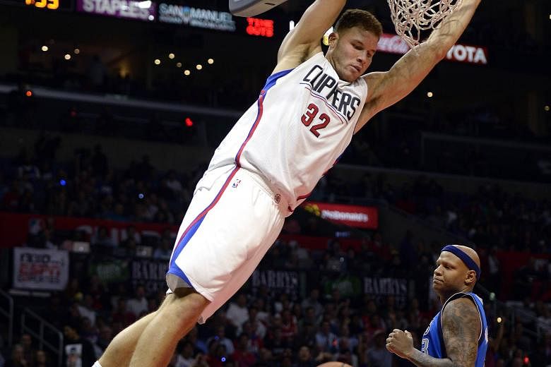 The high-flying Blake Griffin of the LA Clippers dunks for two of his 26 points in their win against the Dallas Mavericks