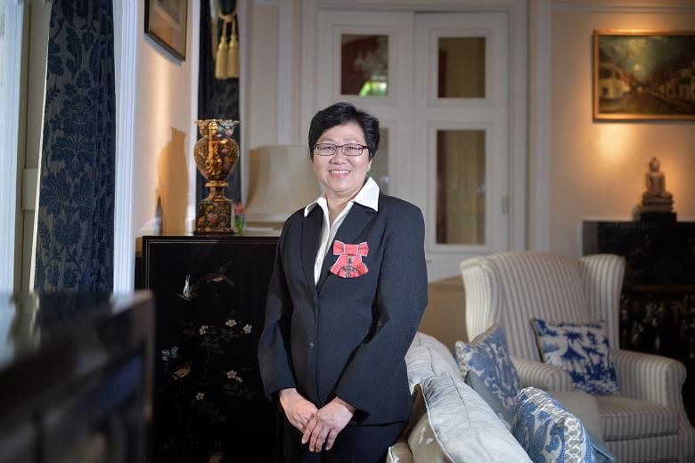 Singaporean Mindy Tay has been working at the British High Commission here for 32 years. She started out as a shorthand typist and is now a trade and investment officer.