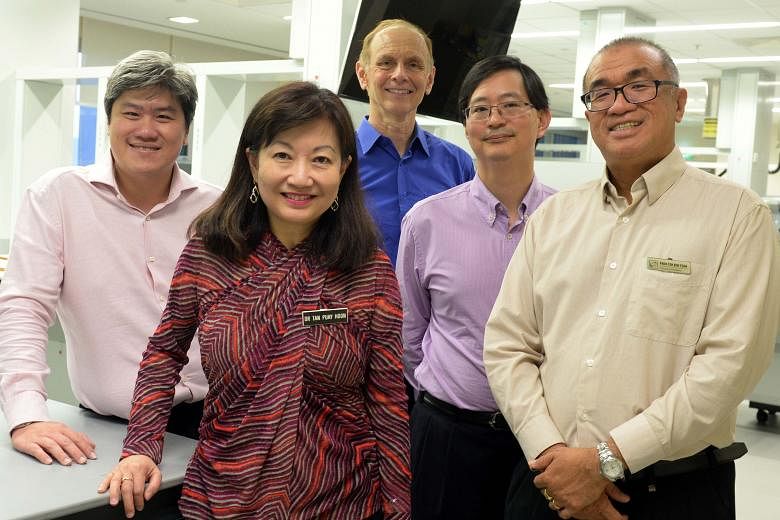 The researchers from the SingHealth Duke-NUS Academic Medical Centre (from far left): Dr Ong Kong Wee, Professor Tan Puay Hoon, Professor Steven Rozen, Professor Patrick Tan and Professor Teh Bin Tean.