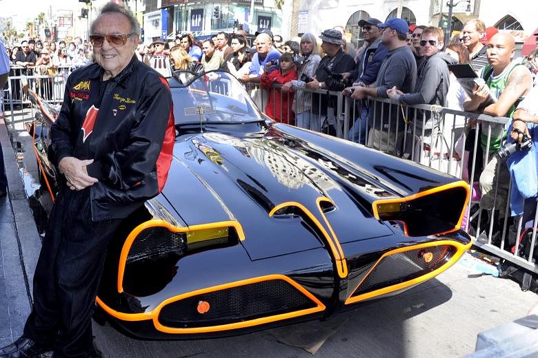 Custom car designer George Barris (left) with the Batmobile he created. He and his brother gained fame through their customisation of the Hirohata Mer (below left).