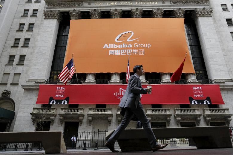 Alibaba (left) took its US$25 billion listing to New York last year. Facebook (above) also has two classes of shares.