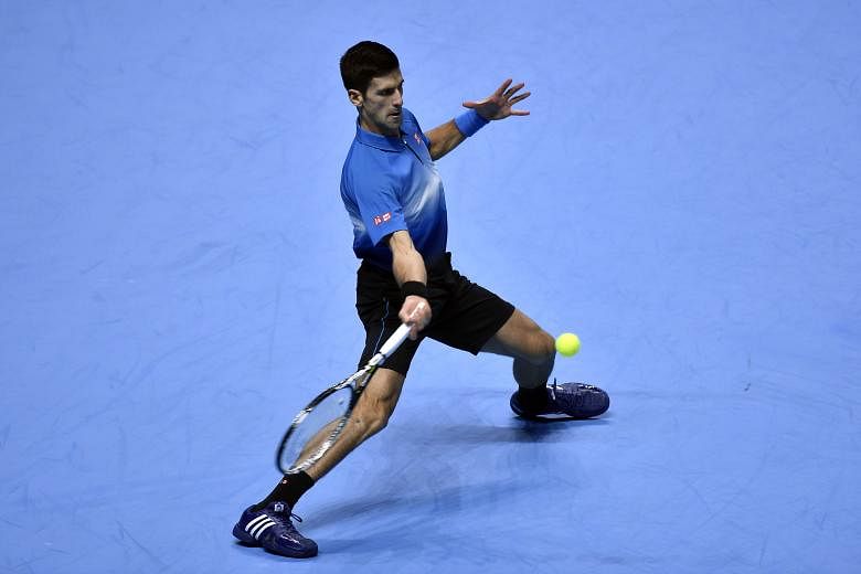 World No. 1 Novak Djokovic in action during his 6-1, 6-1 rout of Kei Nishikori in the ATP World Tour Finals. "It's the best season, best year of my life," said the Serb, who has dominated the 2015 season with 79 victories.