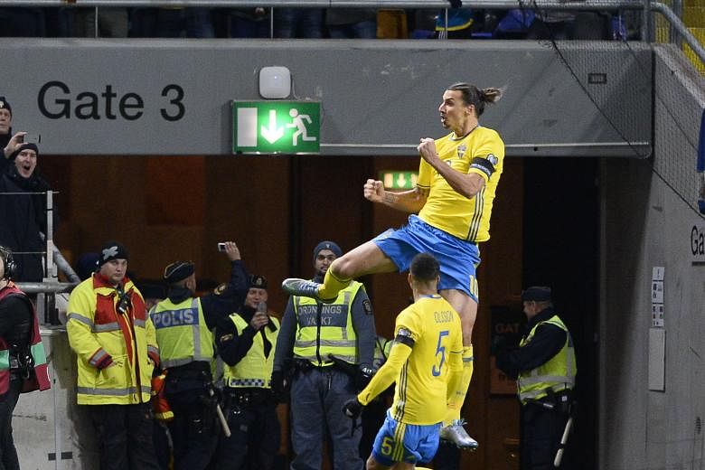 A jubilant Zlatan Ibrahimovic after scoring in the 2-1 victory against Denmark in their Euro 2016 play-off in Stockholm on Saturday. It was his ninth goal in his last nine European qualifiers.