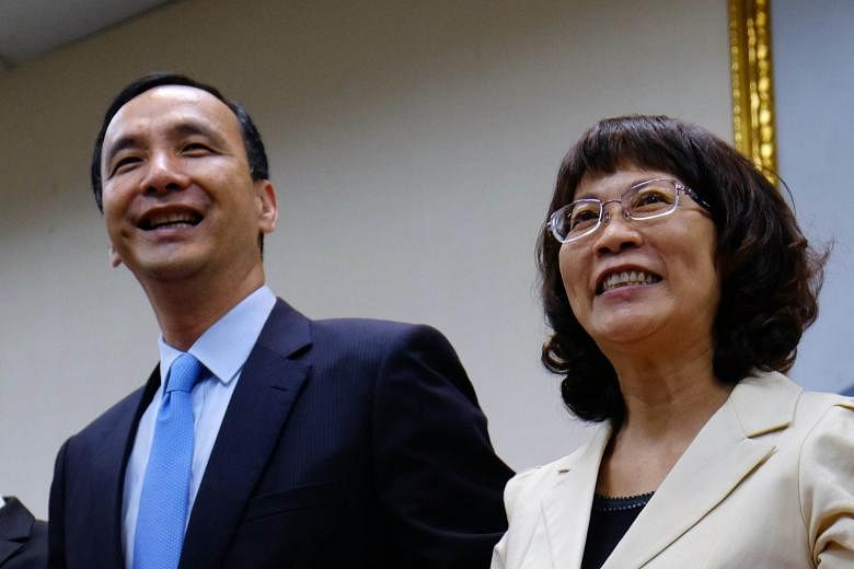 Kuomintang presidential candidate, Mr Eric Chu, with his running mate, Ms Wang Ju-hsuan, at the party's headquarters in Taipei, yesterday. Ms Wang was labour affairs minister from 2008 to 2012.