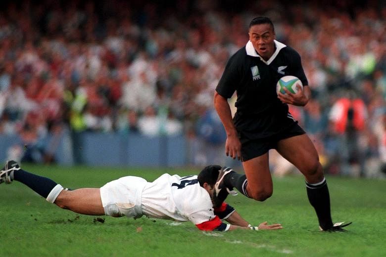 Jonah Lomu brushing off England winger Tony Underwood in the 1995 Rugby World Cup semi-final, en route to his stunning try that was voted the best in World Cup history. Lomu was the catalyst of New Zealand's 45-29 victory against England, but the All