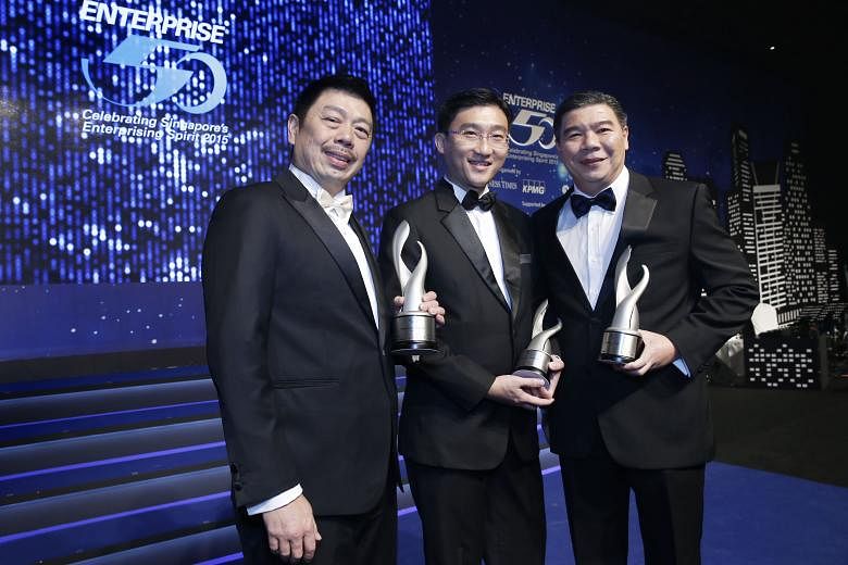 Enterprise 50 top award winners (from far left) CEO Ang Kiam Meng of Jumbo Group (second place); managing director Chia Kuan Wee of Rotating Offshore Solutions (first place); and director Victor Khaw of AllAlloy (third place). The awards recognise 50