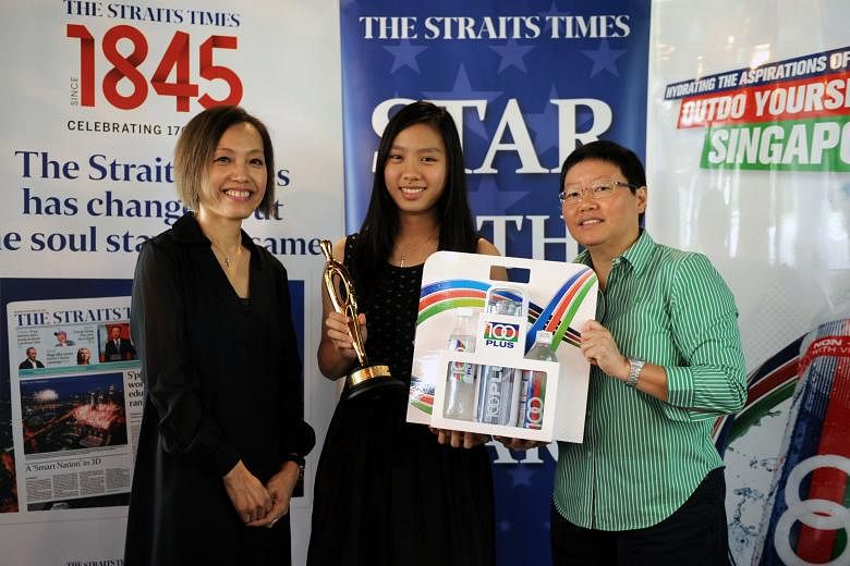 Yeo Jia Min (left) and Crystal Wong after clinching the girls' doubles title at the Badminton Asia Under-17 Junior Championships in Indonesia last month. About an hour earlier, Jia Min had also won the singles. ST Star of the Month Yeo Jia Min, 16, w