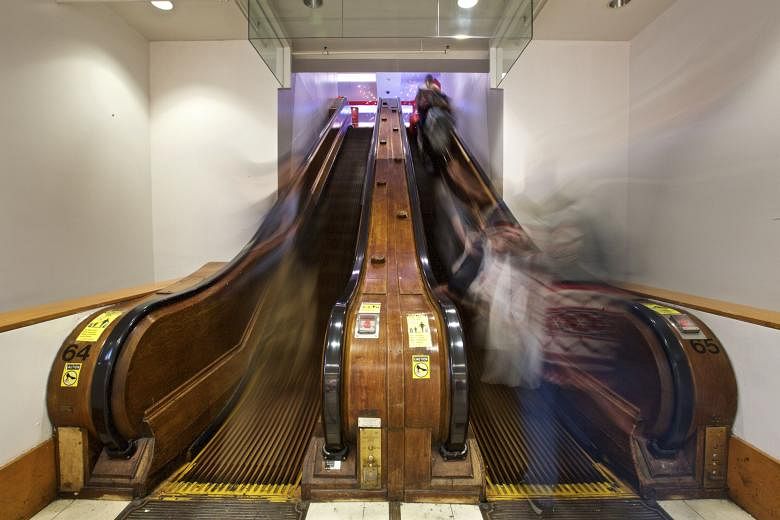 A wooden escalator at the mall after the renovation.