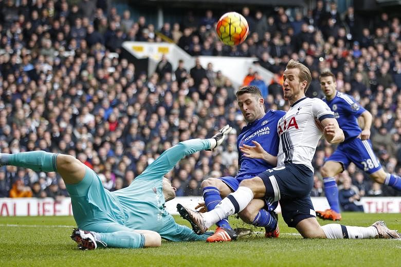 Chelsea 'keeper Asmir Begovic was hurt in this collision with Gary Cahill and Spurs' Harry Kane. But he was able to continue after treatment.