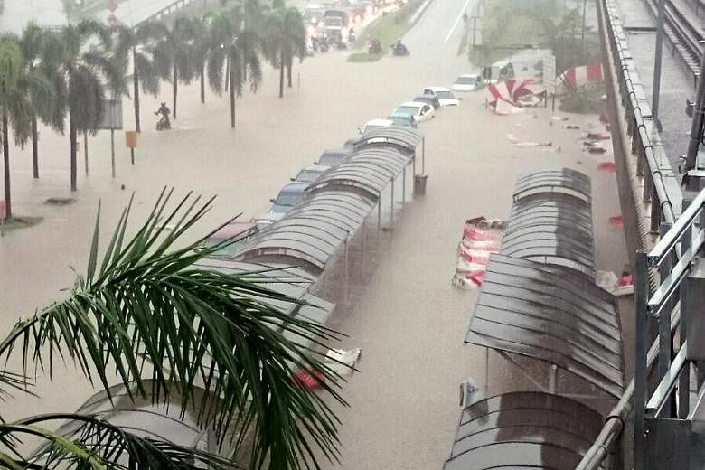 The Sungai Besi LRT station in Kuala Lumpur surrounded by flood waters on Monday. Yesterday, six Malaysian states issued alerts after water levels reached worrying levels, reported The Star newspaper. The Drainage and Irrigation Department's website,