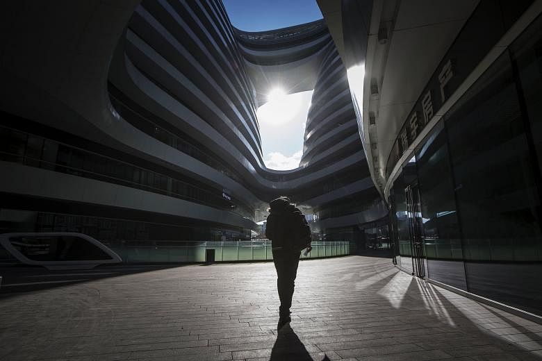 The Galaxy Soho complex (above) in Beijing. As China transforms into a two-speed economy - faster growth in services, slower growth in industry - opportunities arise within new economy segments like Internet, healthcare, insurance and tourism.