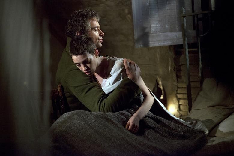 A scene from Les Miserables shows Hugh Jackman in the role of Jean Valjean and Anne Hathaway in the role of Fantine. Ms Suu Kyi (right) picks Valjean over Ulysses despite Ulysses being the epitome of individual endeavour.