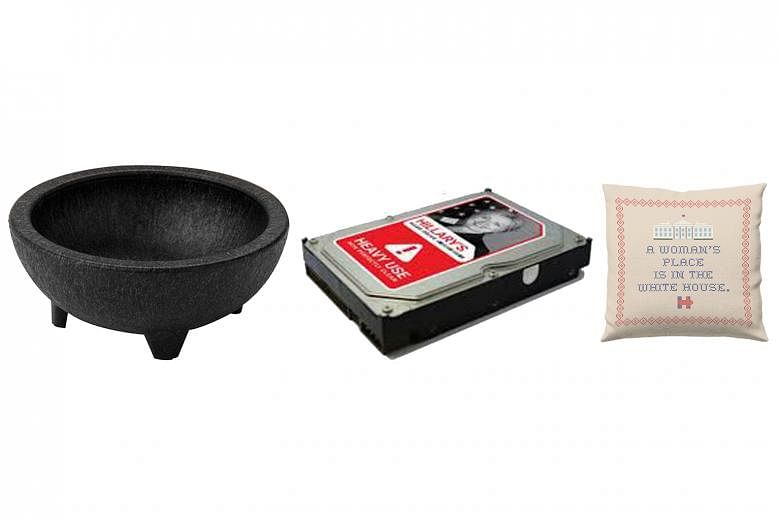Some items for sale include (from left) a guacamole bowl from Mr Jeb Bush's team, a hard drive sold on Senator Rand Paul's online store and a throw pillow from Mrs Hillary Clinton. Merchandising brings in some extra money and also helps candidates br