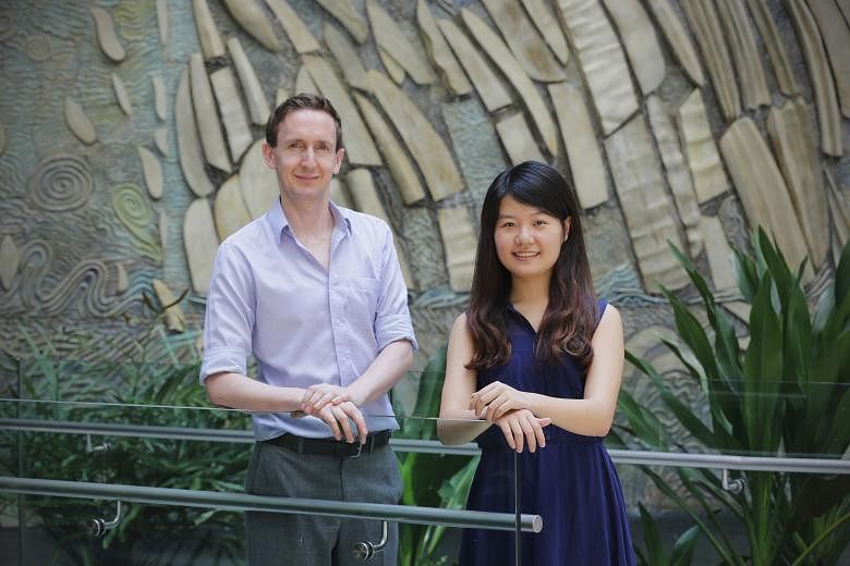 NUS Assistant Professor Ryan Chisholm and fourth-year student Lin Yuan hope to poll Singaporeans to find out if they are willing to pay a "haze tax" that guarantees good air quality.