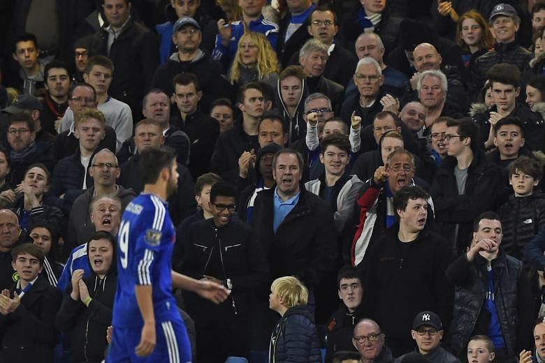Chelsea fans gesturing and booing Diego Costa off the pitch as he is substituted during the 3-1 win over Sunderland at Stamford Bridge.