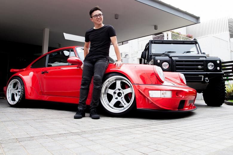 Mr Jansen Tan with his Porsche 911 (Type 964) and Land Rover Defender 110.