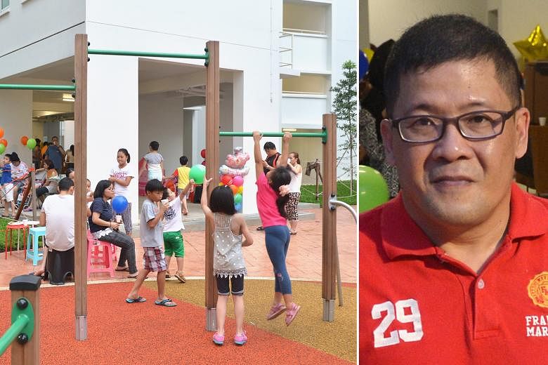 Mr Derek Tan (above) spearheaded yesterday's gathering (left) of Punggol Opal residents, who had grown closer through an online group chat.