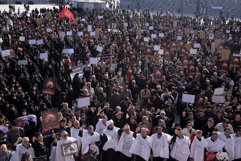 Iranians protesting against Saudi Arabia's execution of Shi'ite cleric Nimr al-Nimr, at Imam Hussein Square in Teheran on Monday. Tensions are rising in the Middle East after Riyadh and several of its allies broke off or downgraded ties with Iran aft