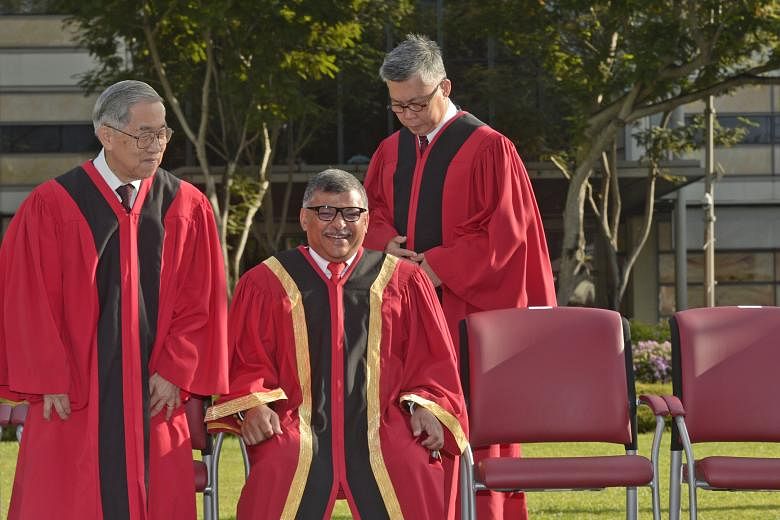 Getting ready to take their seats for the group photo at the Opening of the Legal Year 2016 yesterday are (from left) Judge of Appeal Chao Hick Tin, Chief Justice Sundaresh Menon and Justice Steven Chong.