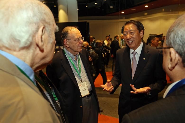 Mr Teo (right) with speakers of the Global Young Scientists Summit 2016, Nobel Prize winner in Physics, Professor Jerome Friedman (left), and Turing Award winner, Professor Richard Karp, at the opening ceremony yesterday.