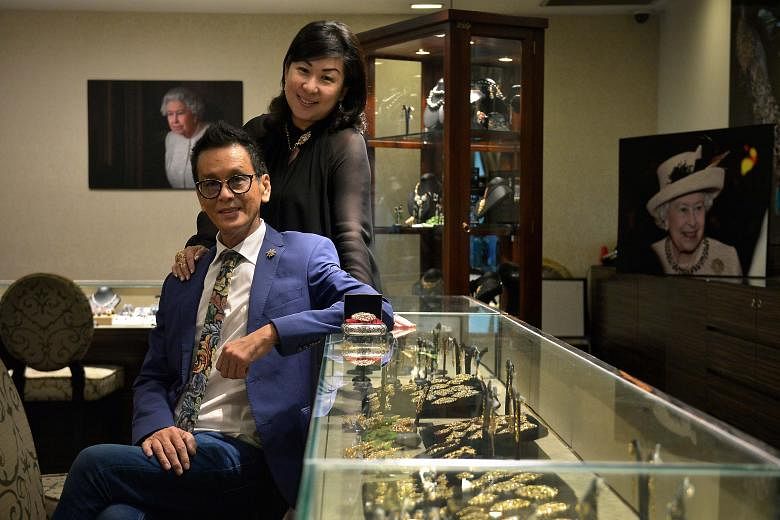Mr Thomis Kwan and his wife Caroline run Foundation Jewellers, which sells Peranakan-style pieces designed by him as well as contemporary pieces. Queen Elizabeth II (above) wearing Foundation Jewellers' Bird Of Paradise Pendant & Brooch (left) at the