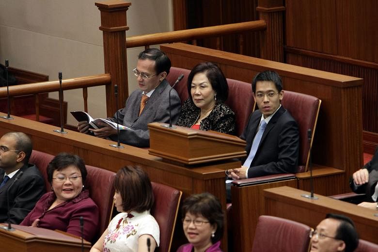 (Back row, from left) Then NCMPs Yee Jenn Jong, Lina Chiam and Gerald Giam at the opening of the 12th Parliament on Oct 10, 2011. PM Lee said on Wednesday that he intended to raise the minimum number of opposition MPs in Parliament.