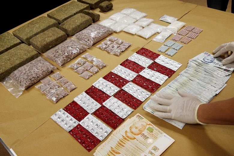 The haul of drugs and cash seized during the four-day operation this week by CNB officers, who carried out islandwide raids, including on budget hotels and nightspots.