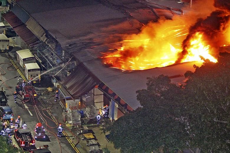 The fire started at the Block 11 units in Toa Payoh Industrial Park at 2.25am and took 60 firefighters around 90 minutes to contain. It was eventually extinguished at 6.30am. The roof of Jetwind Printing and Packaging collapsed and one of the awnings