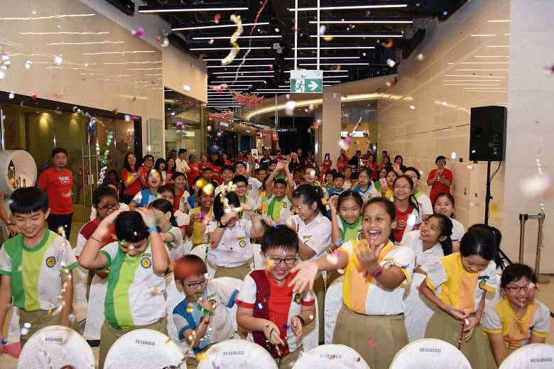 About 70 children were competing to win a tablet yesterday at Orchard Gateway as they played a variety of games to get a better understanding of money. The stage games they played were based on a mobile phone game called OCBC Mighty Savers, which tea