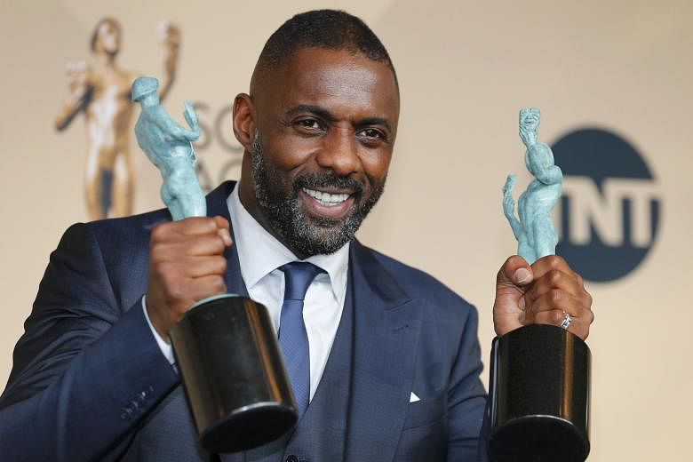 Idris Elba (above) is best supporting actor for playing a mercenary commander in Netflix's West African war film Beasts Of No Nation, and best actor in a miniseries for BBC's crime drama Luther.