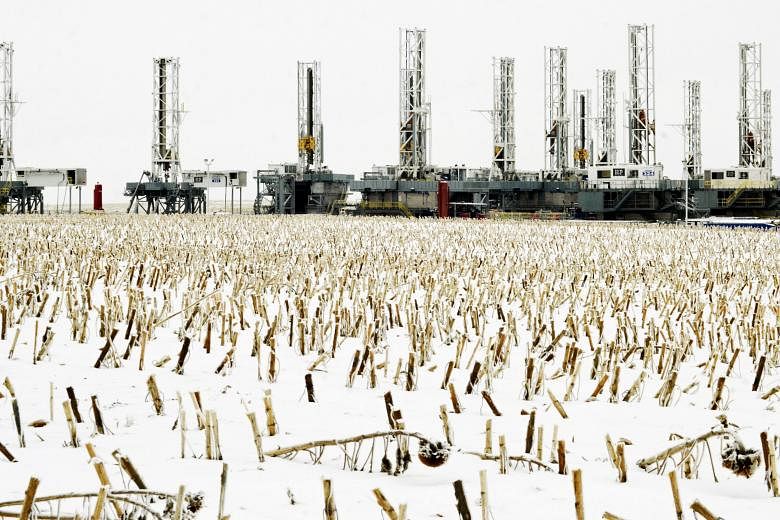 Dormant oil drilling rigs being parked in Dickinson, North Dakota in the United States. Rig-builders are feeling the dramatic repercussions from plunging oil prices, with oil majors continuing to slash capital expenditure while announcing job cuts in
