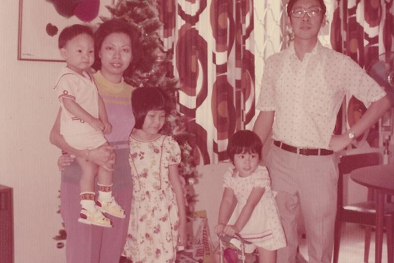 My life so far: Ms Kan with her family, including her mother, Madam Mary Chew, and younger brother, Kenneth, at Christmas in the late 1970s.