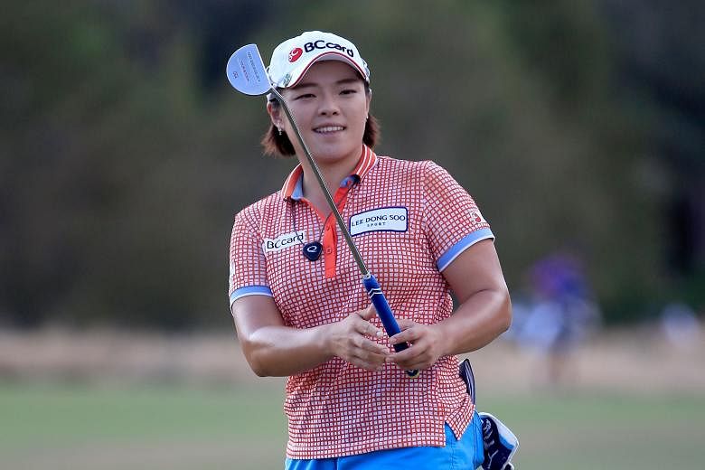 South Korea's Jang Ha Na kissed the ground after her albatross on the eighth hole at the Pure Silk Bahamas LPGA Classic on Saturday.
