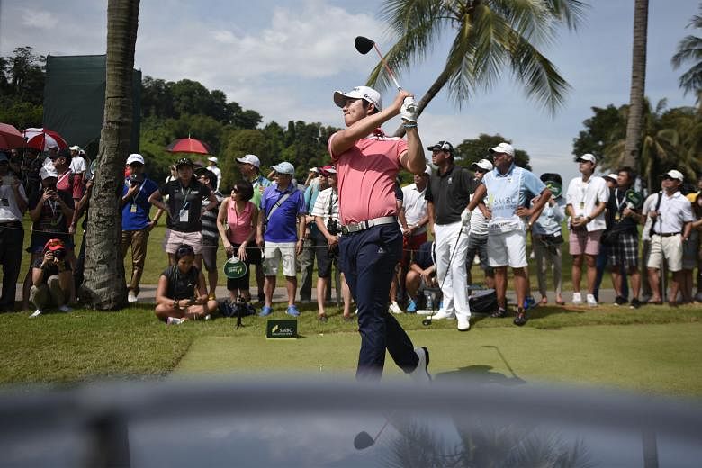 Song Young Han of South Korea teeing off at the fourth hole yesterday during the final round of the SMBC Singapore Open at Sentosa Golf Club's Serapong Course. Victory today would make him the first Korean to win the tournament.