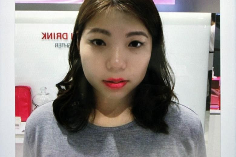 The writer tries the Laneige Beauty Mirror (left) and how she looked with her virtual makeover (above).