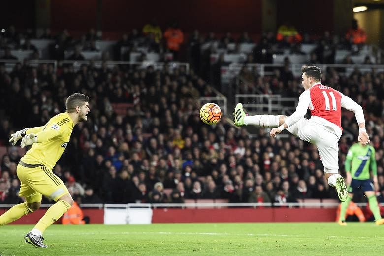 Mesut Oezil (right) missing an opportunity to score during the match between Arsenal and Southampton which ended in a 0-0 draw.
