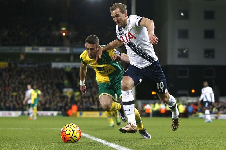 Tottenham's Harry Kane tussling for the ball with Norwich's Ivo Pinto during their league game on Tuesday. He scored a brace in the 3-0 win and will be looking to get on the scoresheet again when his side face Watford today.