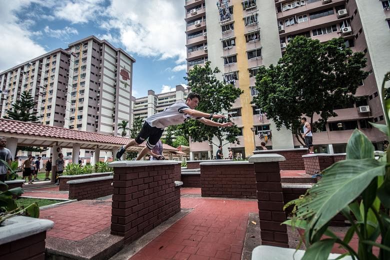 A parkour practitioner leaping across the waist-high brick walls at the "Bedok Maze" during the Lion City Gathering last month.