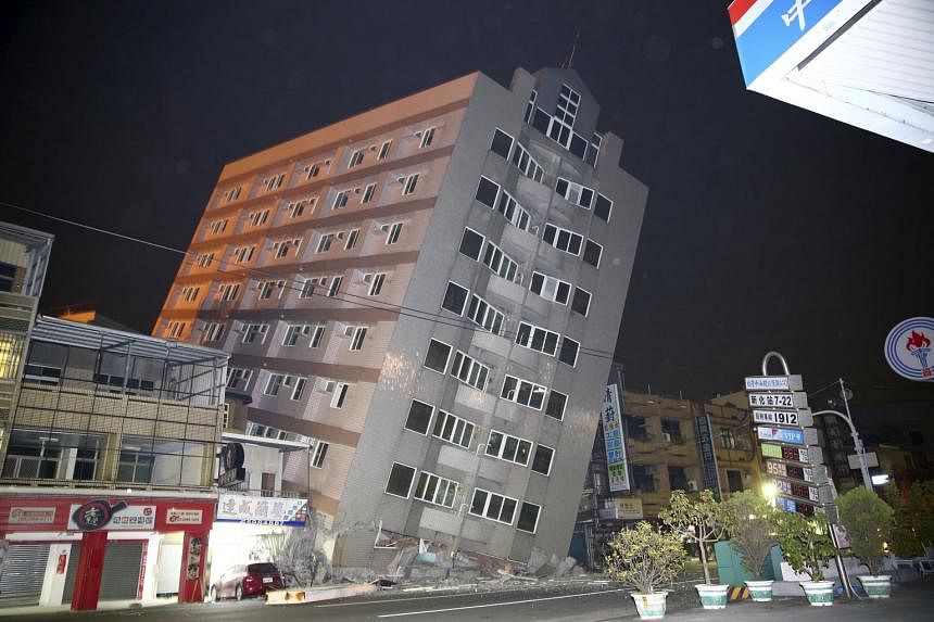 More than a dozen buildings in Tainan, a city of two million people, collapsed during yesterday's quake. Five others were left tilting at alarming angles, a government emergency centre said, as the lower floors buckled during the violent shaking that