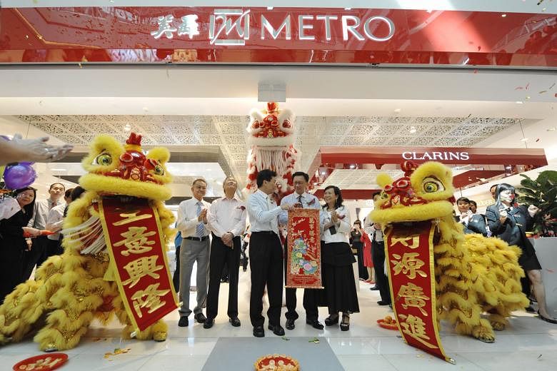 Mr Jopie Ong (above) died at the age of 75. Left: Mr Ong (second from left) at the opening of Metro City Square Mall in 2009 by Mr Lee Yi Shyan (centre), then Minister of State for Trade and Industry.