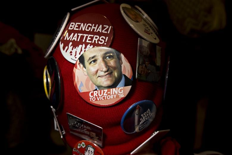 A voter wearing a hat covered in Ted Cruz campaign buttons. Despite getting ahead at the Iowa caucuses, an NBC News/Wall Street Journal/Marist Poll last Friday did not show Mr Cruz getting the kind of bump winners often get from a strong Iowa showing
