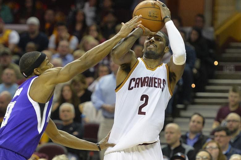 Kings guard Rajon Rondo fouling Cavaliers guard Kyrie Irving on a made three-point basket in the fourth quarter. Irving is still not fully fit but matched his season-high score and tied his career best of 12 assists, as Cleveland won 120-100.