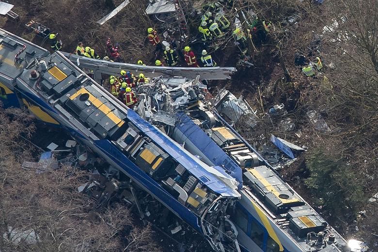 The carnage left behind after two commuter trains crashed head-on yesterday near Bad Aibling, a spa town south-east of Munich. Hundreds of firefighters, emergency services workers and police officers were deployed in the rescue, which was made more c