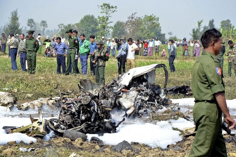 The propeller plane, which was carrying five crew members and believed to be on a routine patrol, went down near the airport in Naypyitaw yesterday.