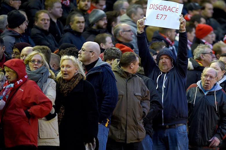 Liverpool fans walking out of Anfield stadium on Saturday in protest against the club's proposal to increase ticket prices from next season. Their stance found widespread support among fans from other clubs and even earned the backing of British Prim