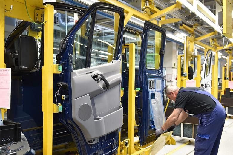 Mercedes vehicles being manufactured in Lundwigsfelde, Germany. Sustained low oil prices and inflation are expected to fuel private consumption.