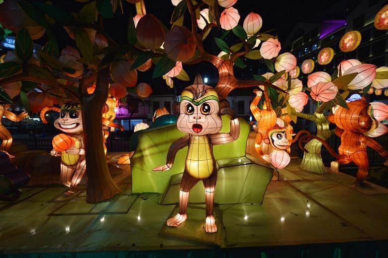 Take home these cute monkey lanterns (right and below) and, if you have space in your compound, you can even request one of the seven 6m-tall peach tree lanterns (above). Organisers of the Chinese New Year festival in Chinatown hope to promote recycl