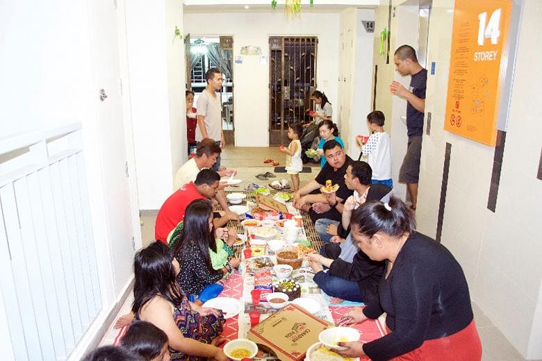 The Kampung Makan group gets residents in a Sembawang neighbourhood to eat together along their corridors every month.